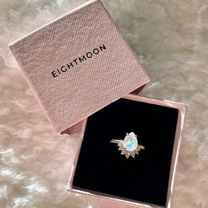 Moonlit Pear Cut Moonstone and White Topaz Ring in a pink gift box